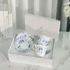 Conjunto de Presente de Xícara e Pires para Café de Porcelana de Ossos Azul e Branco de Alta Qualidade Estilo Japonês Atacado Vintage Luxo Leve Xícara e Pires para Chá da Tarde