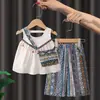 Conjunto de Verão Listrado para Meninas 2026 Novo Estilo Blusa de Manga Curta com Babados e Calças Flare Conjunto de Duas Peças para Bebês Meninas