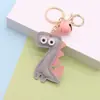 Llavero de Dinosaurio de Dibujos Animados Colgante para Bolso de Piel PU Llavero de Campana de Cuero Personalizado Llavero de Coche Colgantes de Regalo