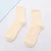 Cor de doce 21 cores cor sólida Meia-calça de tubo quente feminina de velo de coral para casa meias de chão meia de veludo meia-calça atacado