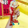 Amuleto de Buena Suerte Original Jinnew - Llavero Colgante de PVC Danza del León con Cojín, Elemento de Diseño Único Colgante para Bolsa