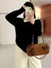 Suéter casual de punto con bloques de color y cuello tipo polo para mujer talla grande estilo otoño 2026 suéter de punto trenzado retro para mujer talla grande 25210