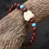 Pulsera Despertar del León de Sándalo Rojo Hoja Pequeña de Zambia DIY Retro Cultural y Creativa para Hombres y Mujeres Pulsera de Cuentas de Madera Buda Estilo Nacional Venta al por Mayor