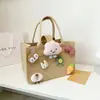 En stock Bolsa de Regalo de Dibujos Animados con Asa Bolsa de Compras Portátil de Gran Capacidad Bolsa de Fieltro Engrosada Bolso de Mano de Fieltro de Celebridad de Internet