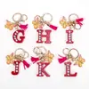 Llavero de Borla de Mariposa con Pedrería Transfronterizo con 26 Opciones de Letras, Colgante de Resina para Bolso, Accesorio de Regalo para Mejores Amigas
