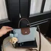 Bolsa Tote al por mayor Modelo Nuevo 2026 para Mujer, Bolso Cruzado Mini de Hombro de Bloqueo de Color de Moda Lujo Ligero
