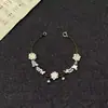 Pulsera de Mariposa Pequeña Color Púrpura Iris, Dulce y Exquisita, Diseño de Nicho de Alto Valor, Flor Tejida a Mano Regalo