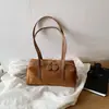 Bolso pequeño cuadrado retro de moda para mujer de este año, nuevo bolso de hombro simple de color liso para otoño 2026, bolso de axila para ir al trabajo
