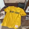 2026 Nova Camiseta de Manga Curta Estilo Coreano Retrô Street Style com Estampa de Letras Inglesas para Mulheres com Letras Grandes Gola Redonda Top de Manga Curta