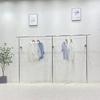 Expositor de tienda de ropa Percha de acero inoxidable montada en la pared Estante colgante lateral para tienda de ropa infantil