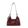Bolso de axila vintage de nicho estilo francés para mujer, nuevo bolso de hombro versátil tipo dumpling de moda invierno 2025, bolso tote para el día a día