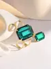 Europa y Estados Unidos suministro transfronterizo de exagerado traje de anillo de pulsera de rubí esmeralda traje de joyería de diseño de nicho femenino
