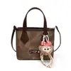 Bolsos Pequeños Populares de Este Año para Mujer Verano 2025 Nuevo Bolso de Hombro Cruzado Bolso de Mensajero Retro de Gama Alta Bolso Cubo