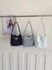 Bolsa pequeña de lona floral para mujer, bolsa de hombro o axila de gran capacidad, versátil, simple, bolsa de mano casual para estudiantes.