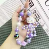 Juguete de Molino de Viento Dibujo Animado Gatito Cadena para Teléfono con Cuentas Llavero Colgante Estuche Portátil para Auriculares Decoración de Bolsa para Mujeres