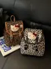 Mochila unisex de moda transfronteriza con estampado de leopardo y diseño de gatito de dibujos animados, mochila escolar para estudiantes, nuevo modelo 2026 mochila de viaje para niños