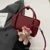 Moda Estilo Coreano Retro Bolsa Quadrada Pequena Feminina 2026 Nova Pequena Bolsa de Mão de Design de Nicho Bolsa Pequena Simples Versátil Transversal