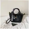 Bolsa tote de seda nueva y elegante para comercio exterior al por mayor, bolsa para mujer, estilo coreano, bolso cubo retro de nicho, bolso de hombro, bolso cruzado