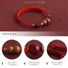 Pulseira de Fio Vermelho com Cabaça de Madeira de Pêssego da Montanha Putuo, Amuleto Protetor de Paz, Boa Sorte, Fortuna e Prosperidade, Pulseira de Corda Tecida à Mão com Cinábrio