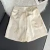Venta al por mayor de shorts de verano versátiles nuevos con efecto adelgazante, estilo chino, fluidos, shorts casuales con un toque de alta gama y diseño versátil