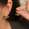 Nuevos Pendientes de Saturno Huecos con Circonitas Cortadas Chapados en Oro Elegantes y Simples Estilo Ins con Cierre de Plata Pendientes de Planeta Elegantes para Mujer