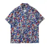 Camisa Masculina Floral Gola Padre 2026 Novo Estilo Coreano Solta Moda Estampada Estilo Praia Casual Manga Curta Exportação