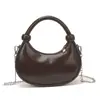 Bolsa Pequena Redonda Versátil Vintage 2026 Novo Estilo de Verão Bolsa de Ombro Transversal Texturizada de Nicho Bolsa de Cor Sólida Tendência com Corrente Bordada