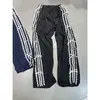 [Salida de fábrica] cintura elástica encaje franja lateral blanca puntera de mariposa pantalones pantalones casuales pantalones deportivos