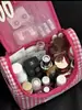 Bolsa de aseo rosa con forma de conejo de gran capacidad, una bolsa de almacenamiento espaciosa, una bolsa de cosméticos de viaje portátil hecha de cuero