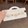 Pulseira de Flor de Trevo de Quatro Folhas com Design de Luxo Leve Fresco e Estiloso, Joia Versátil de Alto Padrão para Uso Diário