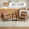 Sillas de sofá de madera maciza estilo nórdico, muebles de ocio para balcón, juegos populares para cafeterías y hoteles, y mesas y sillas de recepción para reuniones y encuentros