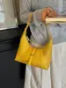 Bolso de axila tipo "dumpling" de estilo francés de nicho transfronterizo 2026 para mujer, bolso de mano moderno y de alta gama, bolso cruzado para el día a día