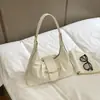 Nuevo bolso de hombro cruzado casual simple de color liso para mujer, bolso exquisito y versátil para la axila, bolsos de mujer al por mayor