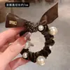 Veludo Dourado Pérola de Unha Argola de Cabelo Intestino Delgado 2025 Nova Chegada Primavera Laço Capa de Couro Simples de Menina Cordão para Rabo de Cavalo