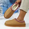 Nuevas botas de nieve UG 2025, disponibles en tallas grandes para ventas transfronterizas, con un diseño de suela delgada estilo étnico y estilo de pareja, así como pantuflas de algodón para mujer