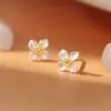 Nuevo producto de verano: Aretes de flor de gardenia frescos y dulces, diseño de nicho, aretes de alta gama, aretes florales elegantes y simples