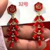 Aretes rojos de alta gama aretes únicos para mujer aretes estilo occidental 2023 nuevos aretes geométricos de nicho populares de moda