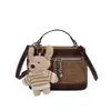 Diseño de Nicho Bolsa de Lonchera de Lona Retro 2026 Bolso de Mano de Moda Bolso Cruzado Exquisito y Elegante Bolso de Hombro
