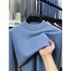 Suéter de cuello alto cruzado al por mayor para hombre, nuevo estilo otoño e invierno 2026, camiseta básica de punto versátil de color liso para hombres de mediana edad