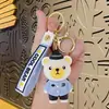 Llaveros de dibujos animados transfronterizos de policía, bombero, policía de tráfico y oso, inodoros y lindos, colgantes para coche y bolso, regalos de figuras