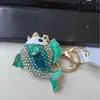 Llavero creativo de pececito dorado pequeño Diamante pez gordo pequeño metal colgante para coche niña colgante para bolso pequeño regalo creativo