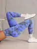 Calça legging de yoga sem costura transfronteiriça, calça de yoga esportiva de alta elasticidade slim fit, pode ser usada na rua, calça fitness da moda de cintura alta com efeito empina bumbum