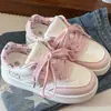 Zapatos de lona con suela gruesa para mujer 2026 nuevos de primavera versátiles blancos estilo coreano para combinar con pantalones de pierna ancha ligeros casuales zapatos de pan