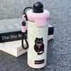 Botella de agua aislada de acero inoxidable 316, diseño elegante y lindo, perfecta para mujeres, con un toque de lujo y un asa portátil