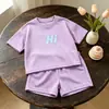 2026 Nuevo Transpirable Secado Rápido Manga Corta Verano Ropa Infantil Niños y Niñas Conjunto Bebé Camiseta Shorts Estilo Coreano Casual