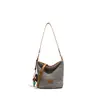 Versión Coreana 2026 del Nuevo Bolso Cubo Tejido Hueco para Mujer, de Gama Alta, Nicho, Bolso de Mano Cruzado Simple y Moderno