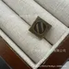 Clip de Cola Universal Hebilla de Extremo de Cuerda de Metal Hebilla de Puño de Pantalón Accesorios para Chaqueta de Plumas Botón de Aleación de Zinc Venta al por Mayor