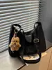 Bolsa tote de moda retrô minimalista transfronteiriça, novo design moderno, fofa e estilosa, bolsa de ombro feminina ou bolsa transversal