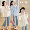 Ropa de maternidad para otoño, nuevo estilo dulce casual fresco de corte holgado, blusa babydoll de retazos con volantes, blusa versátil talla grande