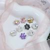 Taladro de uñas Dongzhou de 12 mm con forma de copo de nieve grande y punta inferior, con diamantes de imitación superdeslumbrantes, accesorios de bricolaje, taladro de vidrio de moda simple